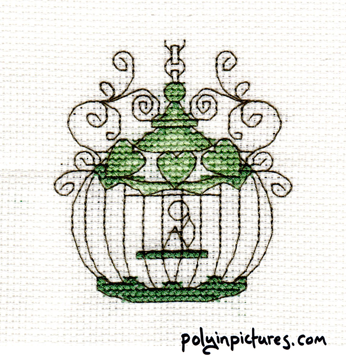 You should've seen the original pattern; it had a bluebird in that cage, and it was supposed to look NICE.